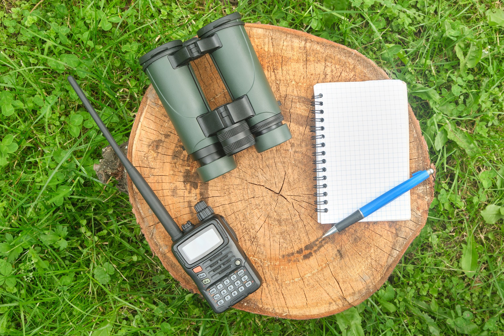 military binoculars, professional outdoor walkie-talkie, notepad, notebook